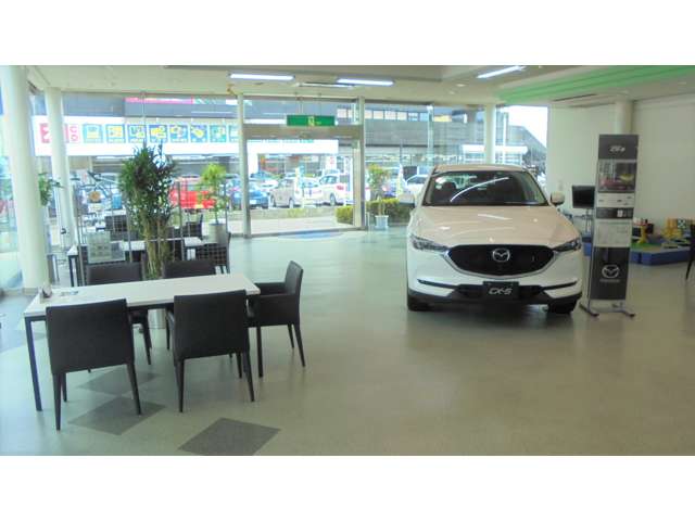 伊予鉄オート株式会社 マツダオートザム伊予鉄久米駅前